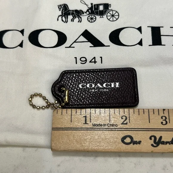 Coach New York Pebbled Leather Bag Tag in mapla with Gold Chain - Picture 7 of 9
